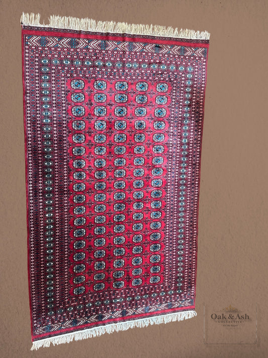 Vintage Hand-Knotted Bokhara Rug | 6’2” x 8’11”